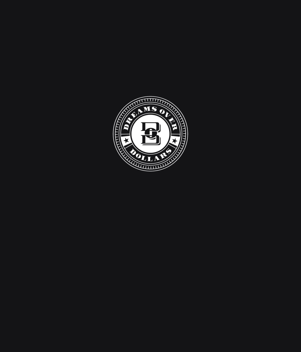 Black t-shirt with small white Dreams Over Dollars seal at left chest